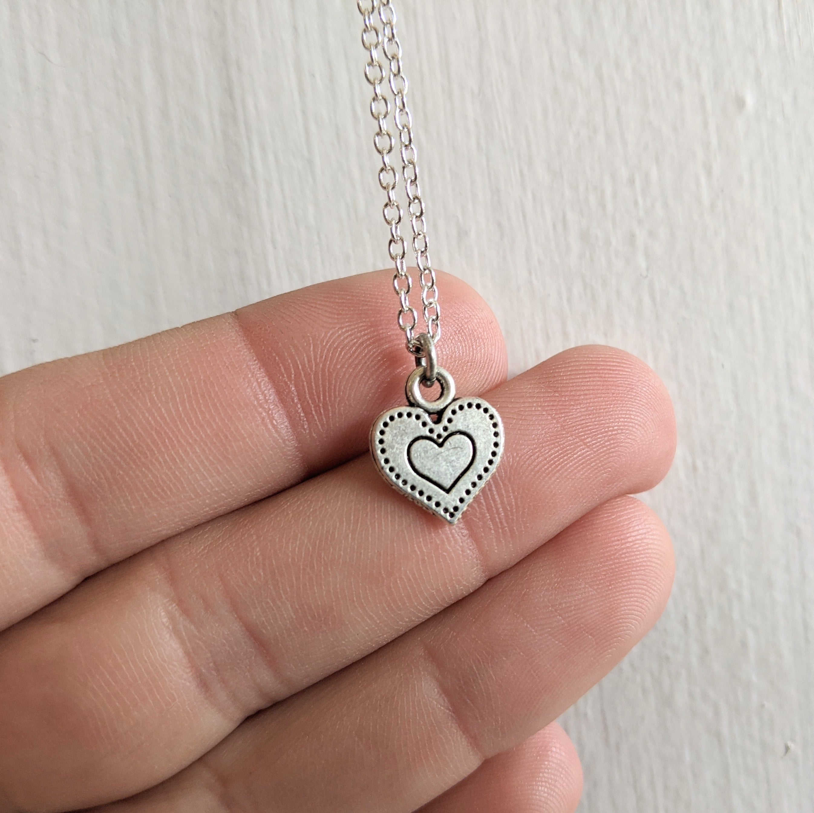 Silver plated store heart necklace